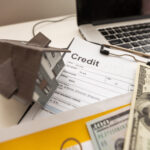 Contract for purchase or rental of house with calculator on table. Getting loan for housing concept